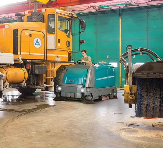 M17 sweeper-scrubber cleaning airport hanger